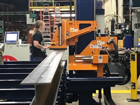 Man working on a conveyor belt in a factory